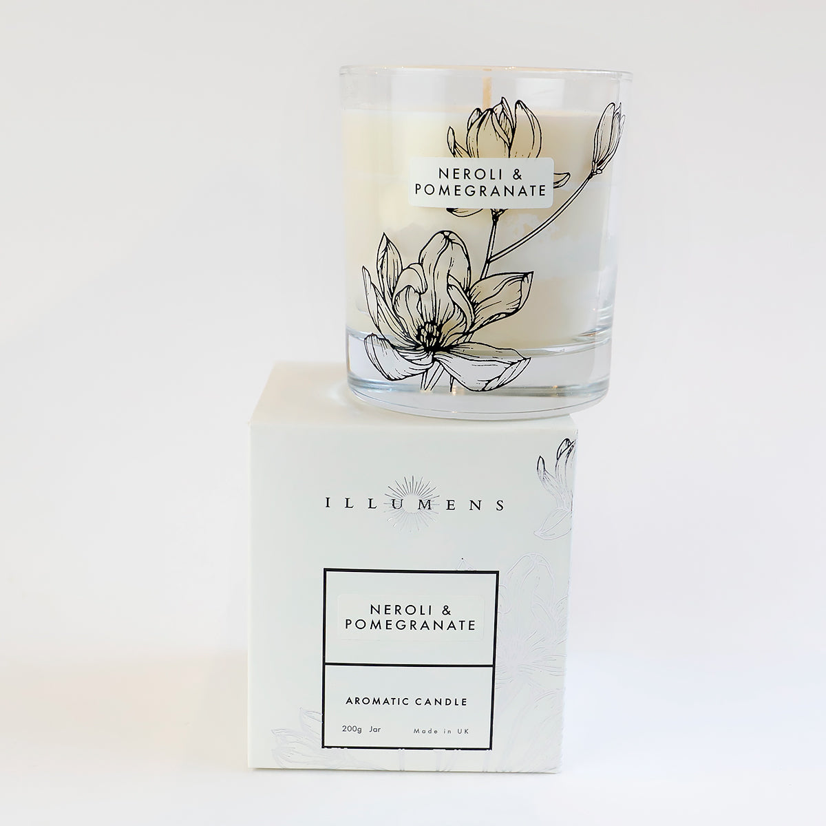 A white box with a candle on top