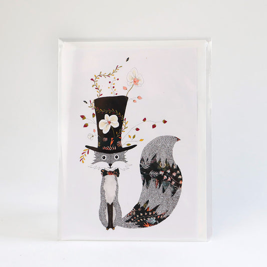 A greetings card illustrated with a fox in a top hat using mixed media techniques