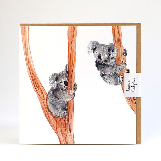 A greetings card illustrated with two koalas