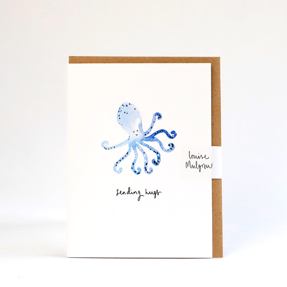 A mini greetings card illustrated with an octopus in a painterly style with the words sending hugs